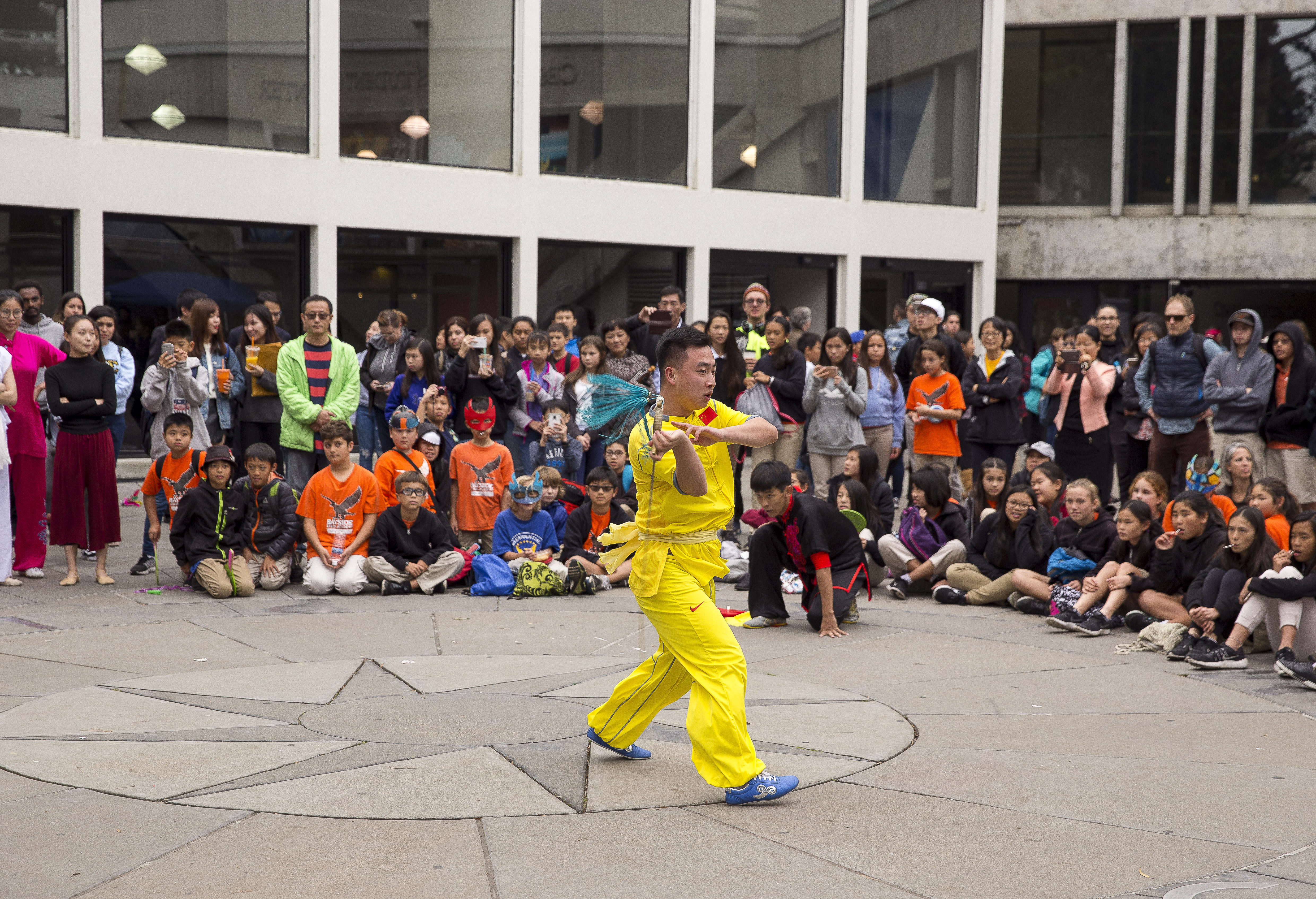 Student performing in Malcolm X Plaza